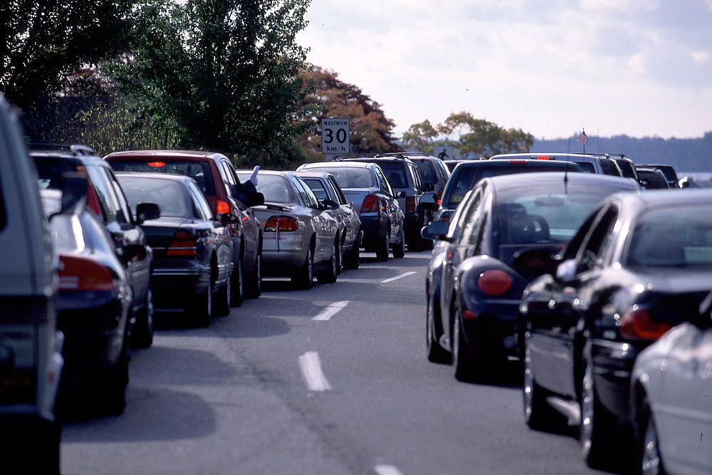 Several cars driving on the road, busy traffic | Dale Adams Automotive Specialists